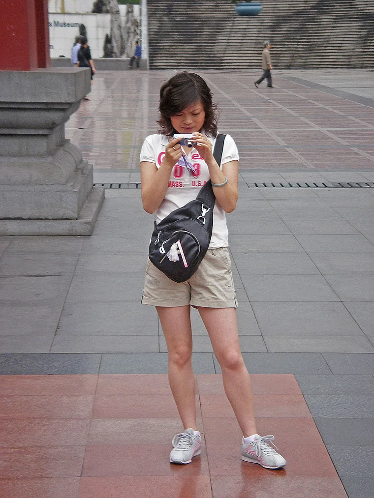 Chongqing junge Frau mit Kamera