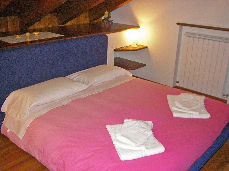 Friaul Sutrio Ferienwohnung Bett