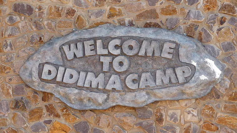 Südafrika Drakensberge Cathedral Peak Didima Camp Schild nah